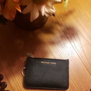 Michael Kors black small wallet.